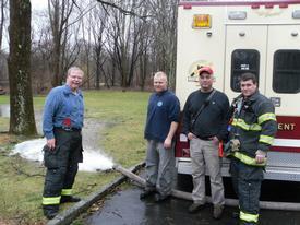 Jim Tipa, Thor Johannessen II, and Jan Johannessen with Banksville FD Chief pumping out basements while mutual aid to Banksville. 3/14/10 (Photos Courtesy of Banksville FD) 